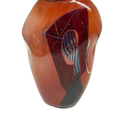 William Morris (American, b. 1957) studio art glass shard vessel, with reddish orange body and iridescent abstract design. Black lip....