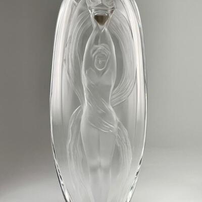 Frosted and clear glass Marie-Claude Lalique â€œEroicaâ€ vase. Depicting a nude figure holding torch above her head, drapery wrapping....