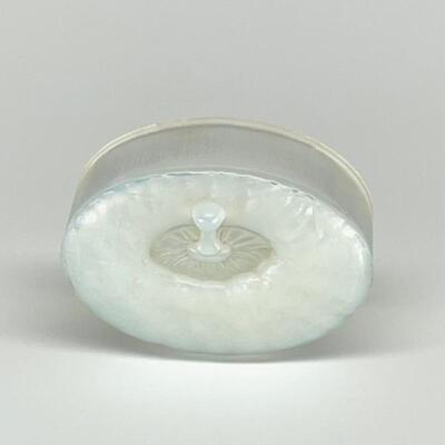 Rene Lalique opalescent glass powder box cover molded as a puff. Circa: 1924. Possibly made for Forvil â€œLa Perle Noireâ€ or Corail...