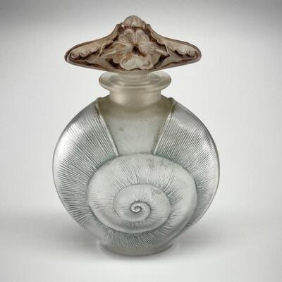 R. Lalique â€œAmphitriteâ€, spiral snail perfume bottle. Blue and brown patina. No. 514. Circa: 1920  Size: 3 3/4â€ high x 2 3/4â€ wide