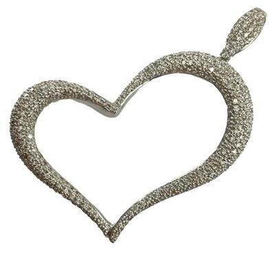 An 18kt white gold heart pendant with pavÃ© set diamonds. Bail marked 18k 750. Heart 2â€ diagonal from top of bail to opposite side. 1...