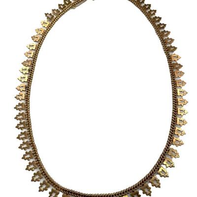 "A tested 14kt rose gold necklace with pierced geometric or leaf form drops, box clasp with safety chain. 

19â€ necklace length,...