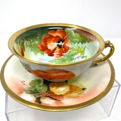 Handpainted Limoges Teacup And Saucer 
