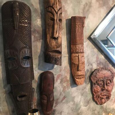 Wooden Carved Masks from Africa and a Stoneware Early Face I, by Rothy Moseley
