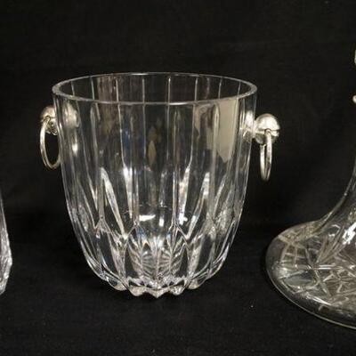 1019	CLEAR GLASS LOT INCLUDING ICE BUCKET W/ CHROME HANDLES, & TWO DECANTERS 
