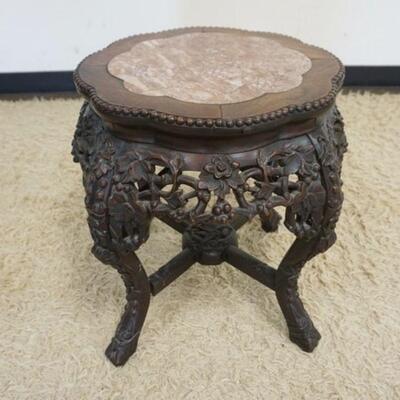 1048	ANTIQUE CARVED MARBLE TOP ASIAN STAND W/ROSE COLORED INSET MARBLE TOP, APPROXIMATELY 21 IN WIDE X 19 IN HIGH
