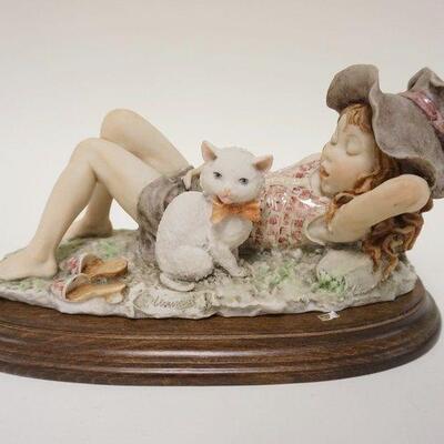 1064	G ARMANI FIGURE OF YOUNG GIRL SLEEPING W/HER CAT, APPROXIMATELY 12 IN LONG X 8 IN HIGH

