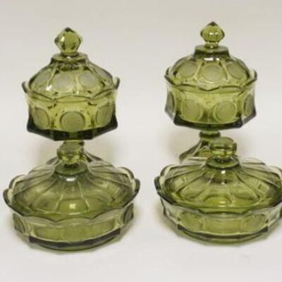 1082	8 PIECES OF OLIVE GREEN FOSTORIA COIN GLASS. LOT INCLUDES FOUR WEDDING BOWLS & FOUR LOW  COVERED CANDY DISHES. WEDDING BOWLS APP. 9...