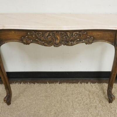 1024	ROSE MARBLE TOP DEMILUNE W/CARVED SKIRT & LEGS, APPROXIMATELY 55 IN WIDE X 16 IN DEEP X 30 IN HIGH
