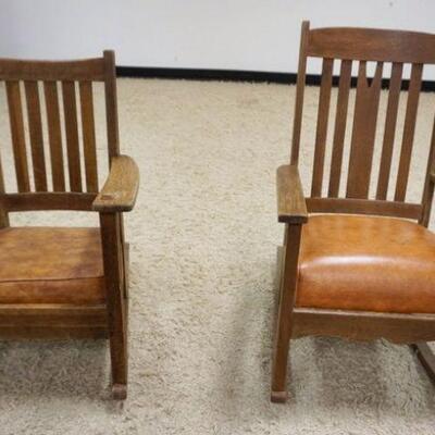 1037	PAIR OF MISSION SOLID OAK ROCKERS W/LEATHER SEATS

