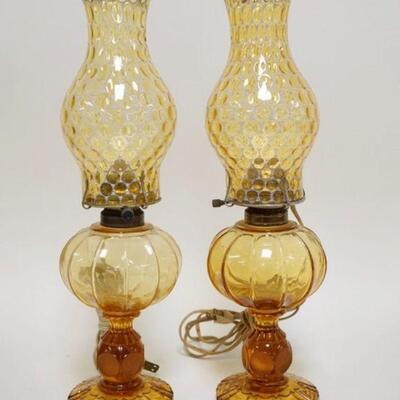1086	2 AMBER FOSTORIA COIN GLASS ELECTRIC OIL LAMPS, 16 1/2 IN H
