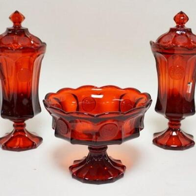 1100	3 PIECES OF RUBY RED FOSTORIA COIN GLASS LOT INCLUDES ONE COMPOTE & TWO COVERED URNS. URNS APP. 13 1/4 IN H 
