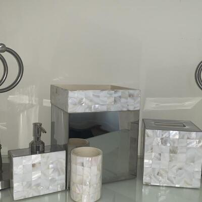 (6) Mirrored & Mother of Pearl Bathroom Items:
Soap Dispenser, Tissue Box, Trash Can, Cup, and 2 Hand Towel Holders (chrome)