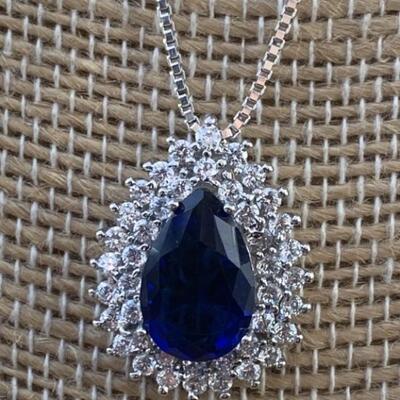 Sterling Silver Necklace with Blue Sapphire and
White Stones