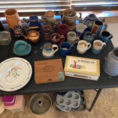 Handmade pottery mugs and teapots