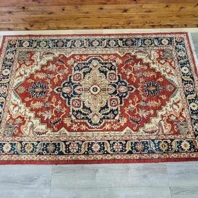 Hand Knotted Oriental Area Rug is 69 x 105