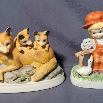(2) Unmarked Porcelain Figurines: Fox Family
Girl with Duck