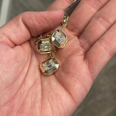 diamond and gold earrings and necklace