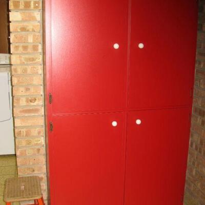 TALL RED STORAGE CABINET  shelving inside .                      Approx 6' x 4' x 18
