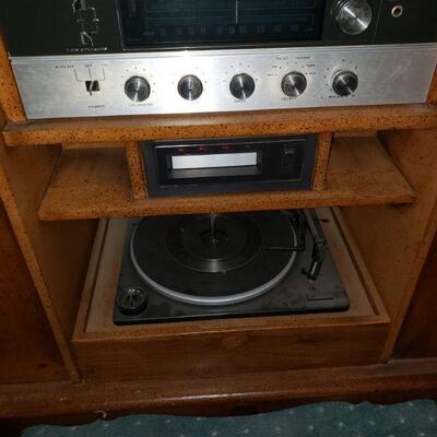 Vintage cabinet turntable, looks like a dry sink when closed. Speakers on sides. 