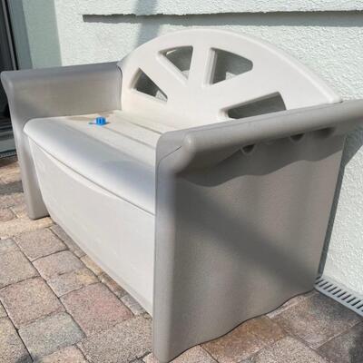 Outdoor pool storage bench