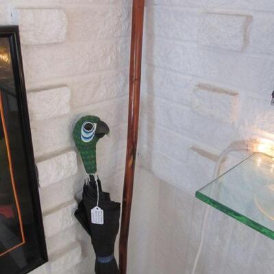 Collectible NY Broadway version of Disneys Mary Poppins famous Umbrella & a lovely carved walking stick.