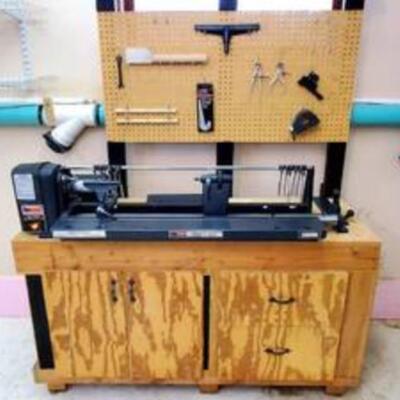 Craftsman Copy Crafter Wood Lathe mounted on a professionally Built Wooden Cabinet. Item was not tested, appears to be in very good...