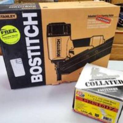 Stanley Bostitch Industrial Stick Framing Nailer with a box of nails