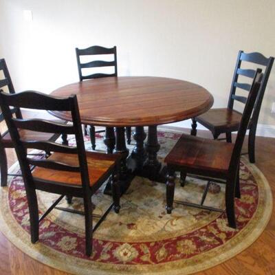Haverty's Logan Circular Dining Table. Antiqued walnut finish. With ladder back chairs. 54 inch
$200  Schedule appointment...