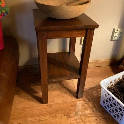 side table with wood bowl