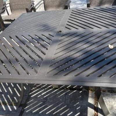 huge patio table comes with 8 chairs