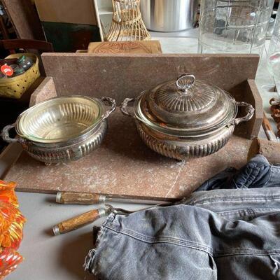 Decorative Silverplate Serving Dishes. Marble Top off a Commode with Sides and Backsplash   