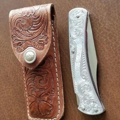 Buck knife 111 engraved with N.E.M on it and original case