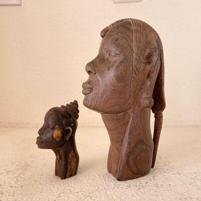 Hand carved wooden woman busts  