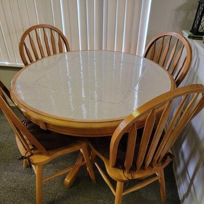 Tile top Kitchen table and 4 chairs $150.00