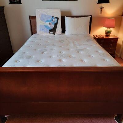 Queen size sleigh bed with mattress . Like new $300.00