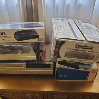 #5716 â€¢ Pastime Electronics ncludes Panasonic FM Stereo Headset Studio II RF-60, VHS Video Tape Rewinder, Digital TV Converter Box,...