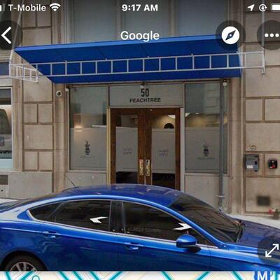 located at the Muse Lofts. Entrance is located on  1 Walton Street under this blue Awning. building is located on Peachtree Street/Walton...