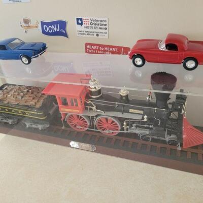 toy locomotive and coal car, other cars sold separately