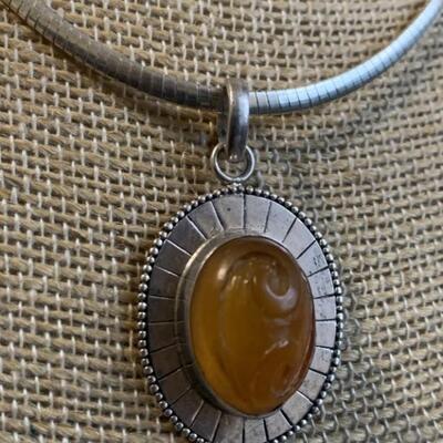 Sterling Silver Necklace with Carved Amber Stone