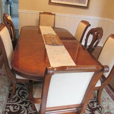 Dining room 
â—¦ Bernhardt dining set including:
â—¦ Table with 2 leaves, 8 chairs, *Breakfront Bernhardt Protective padded table cover ,...