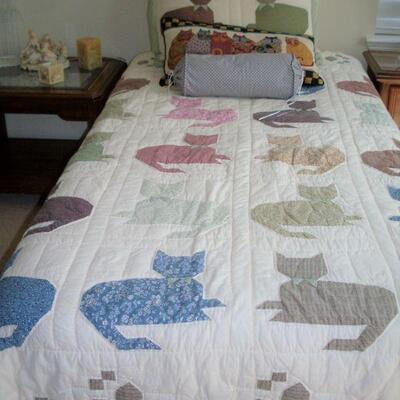 TWIN BED WITH CAT PILLOW AND CAT QUILT