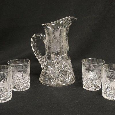 1063	SIGNED TUTHILL CUT GLASS PITCHER & 4 MATCHING TUMBLERS W/FLORAL DESIGN

