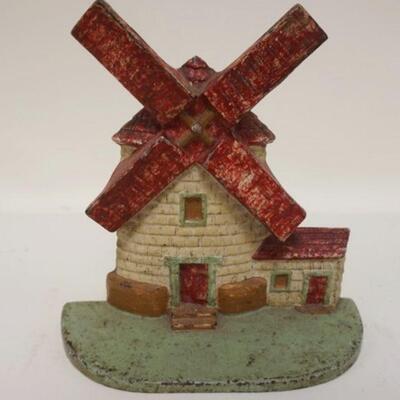 1166	ANTIQUE CAST IRON WINDMILL DOORSTOP, APPROXIMATELY 7 1/4 IN X 7 IN
