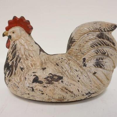 1168	CAST IRON CHICKEN/ROOSTER DOORSTOP, APPROXIMATELY 6 IN X 9 IN
