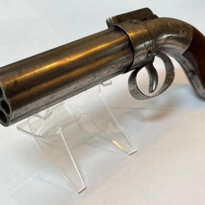 Item # 108 
Antique Allen and Thurber Pepperbox Pistol

     This Allen and Thurber .32 caliber 6 shot Pepperbox pistol was manufactured...