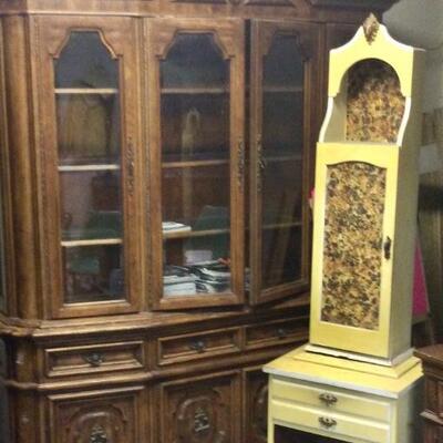Large breakfront, yellow tall cabinet