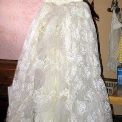 Vintage lacy, full wedding dress.  BUY IT NOW $95