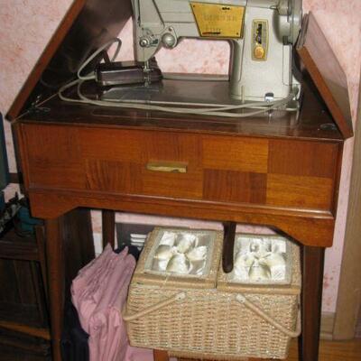 Vintage Singer in cabinet. BUY IT NOW $145