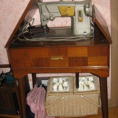 Vintage SInger in cabinet. BUY IT NOW $145